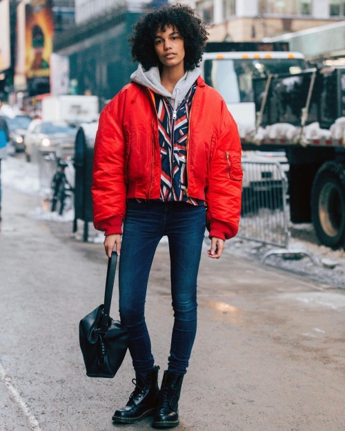 A bright red puffer on the streets of New York (photo c/o @melodiejeng)
